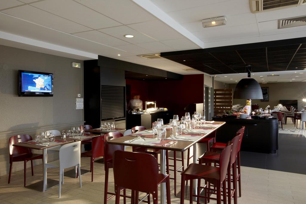 Campanile Saint-Quentin-En-Yvelines Hotell Montigny-le-Bretonneux Restaurant bilde
